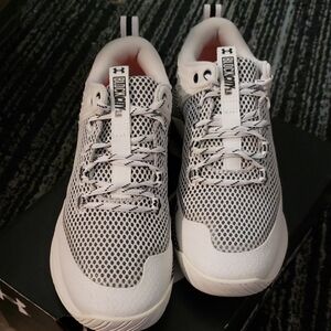 Under Armour Black and White Athletic Shoes with Modern Design